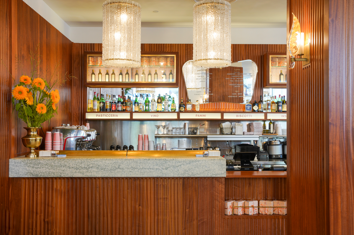 a bar with a counter and lights