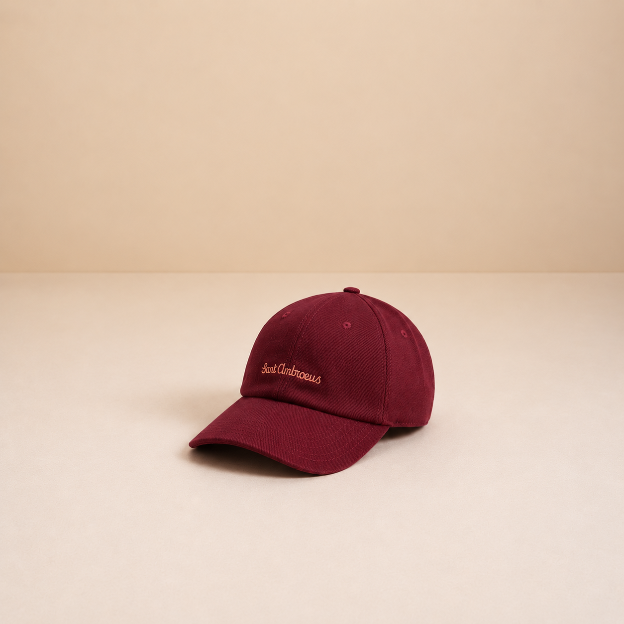 a red hat on a white surface