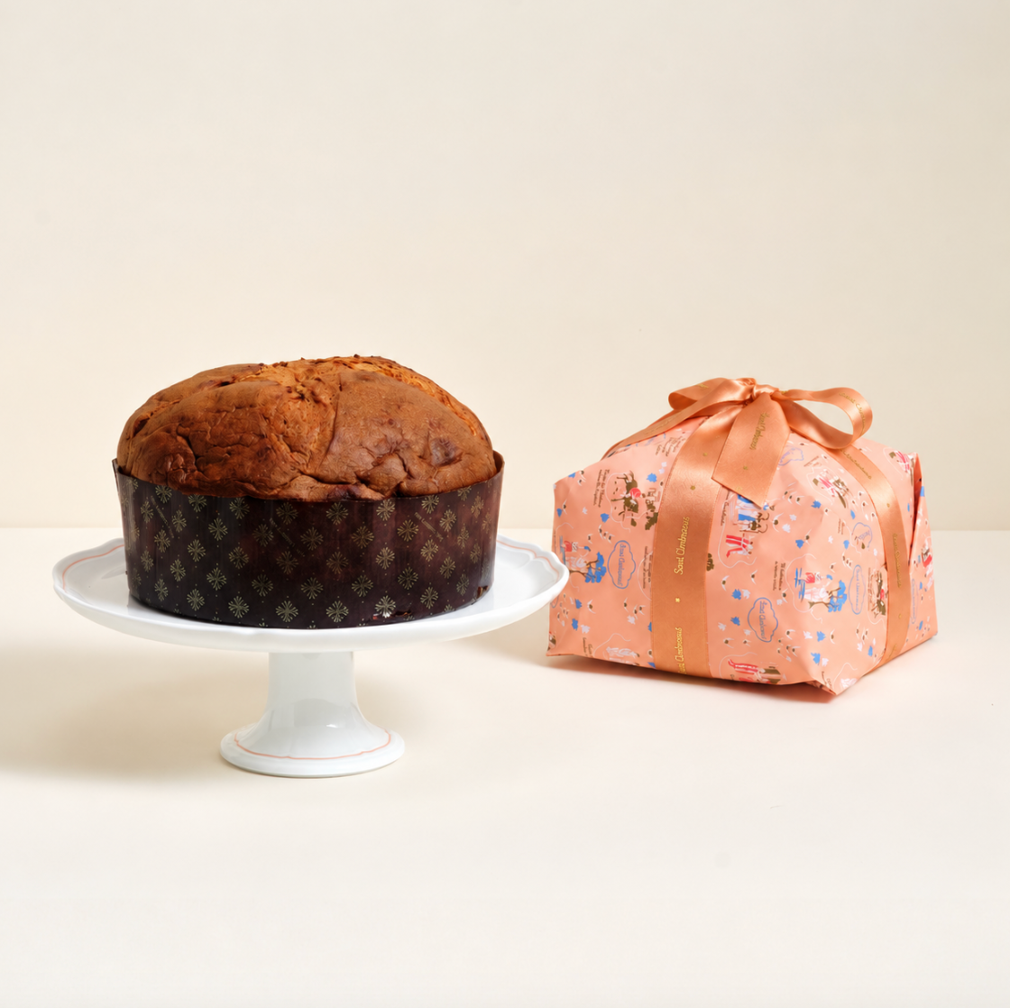 a cake on a plate next to a present
